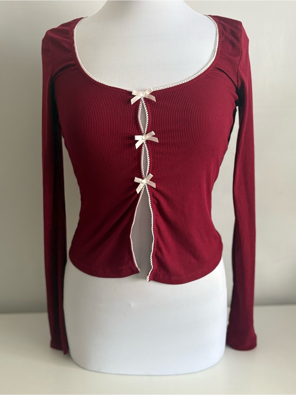 Women's pajama top 
Scoop Neck Burgundy Long-Sleeve Top with Bow Trim